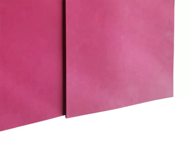 Sample of DEF Rubber's red wear-resistant natural rubber sheet, a high-quality and cost-effective alternative to Linatex Rubber.