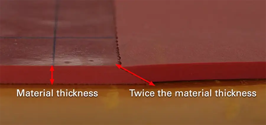 A photo showing the cutting method for rubber joints during the rubber lining procedure for Linatex-type rubber and metal bonding. The joint is typically cut with a sloped structure, where the slope length is twice the material thickness.