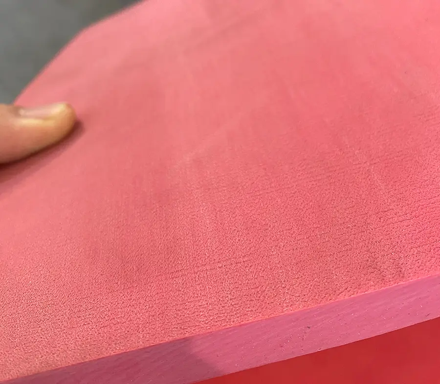 A photo of a Linatex-type rubber material with a roughened surface. Roughening the bonding surface before rubber lining significantly enhances the adhesion strength between the rubber and the metal.