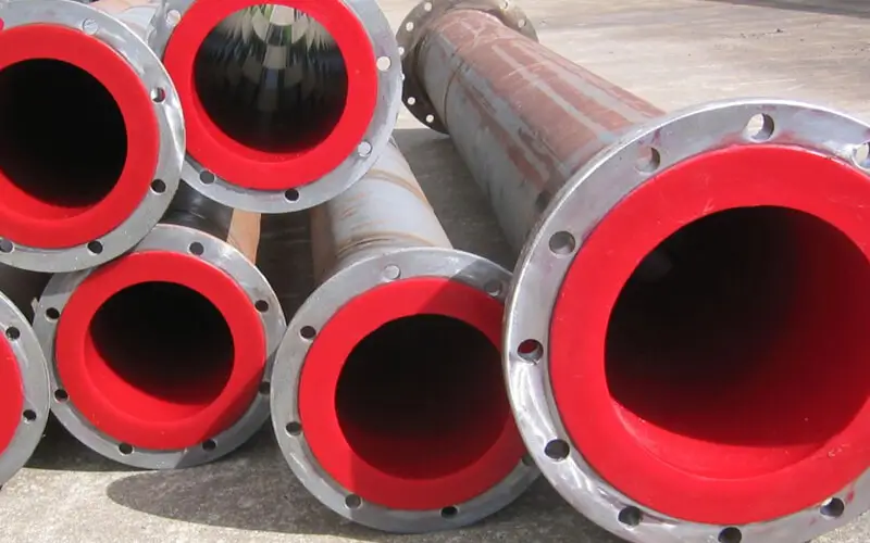 Steel pipe lined with wear-resistant rubber sheets to enhance corrosion resistance, wear resistance, reduce noise, and extend service life. DEF Rubber provides custom rubber sheets to meet specific shape, size, and thickness requirements.