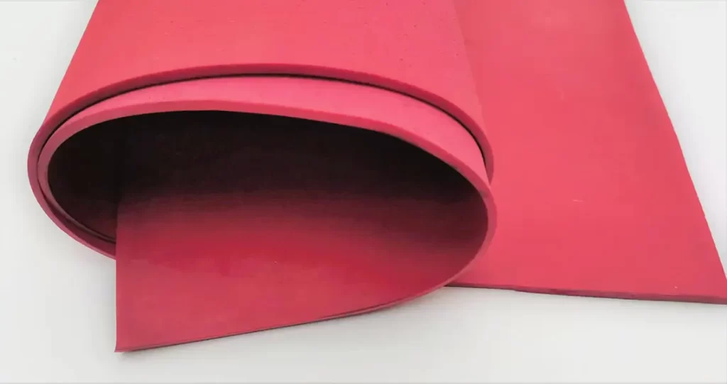 High-quality, wear-resistant red natural rubber sheets, with DEF Rubber offering custom colors for specific applications such as food processing or shooting range backings.